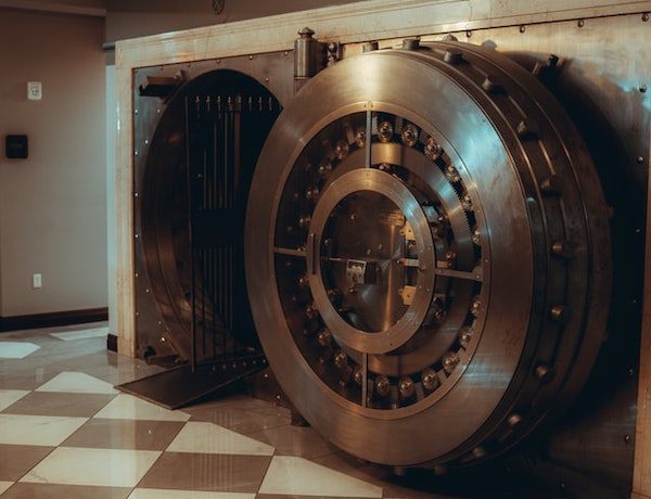 Open bank vault which is often used to secure nest egg money people save to eventually retire with.