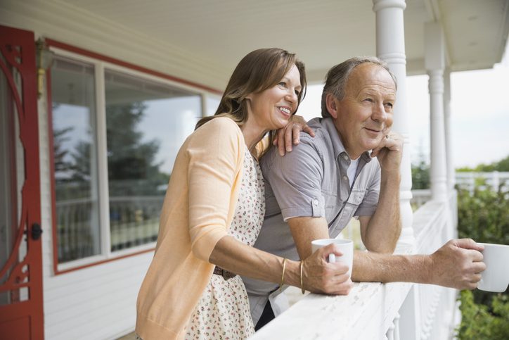 Mature couple understanding the benefits of funeral insurance for seniors.