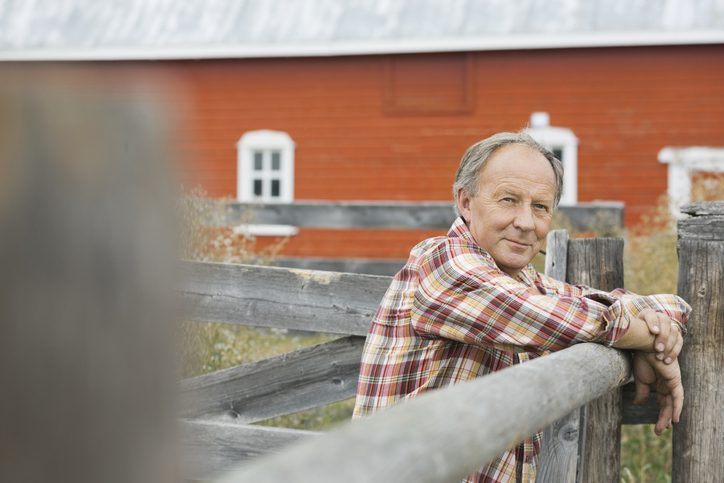A senior farmer in Alberta considering different coverage plans he can buy online.